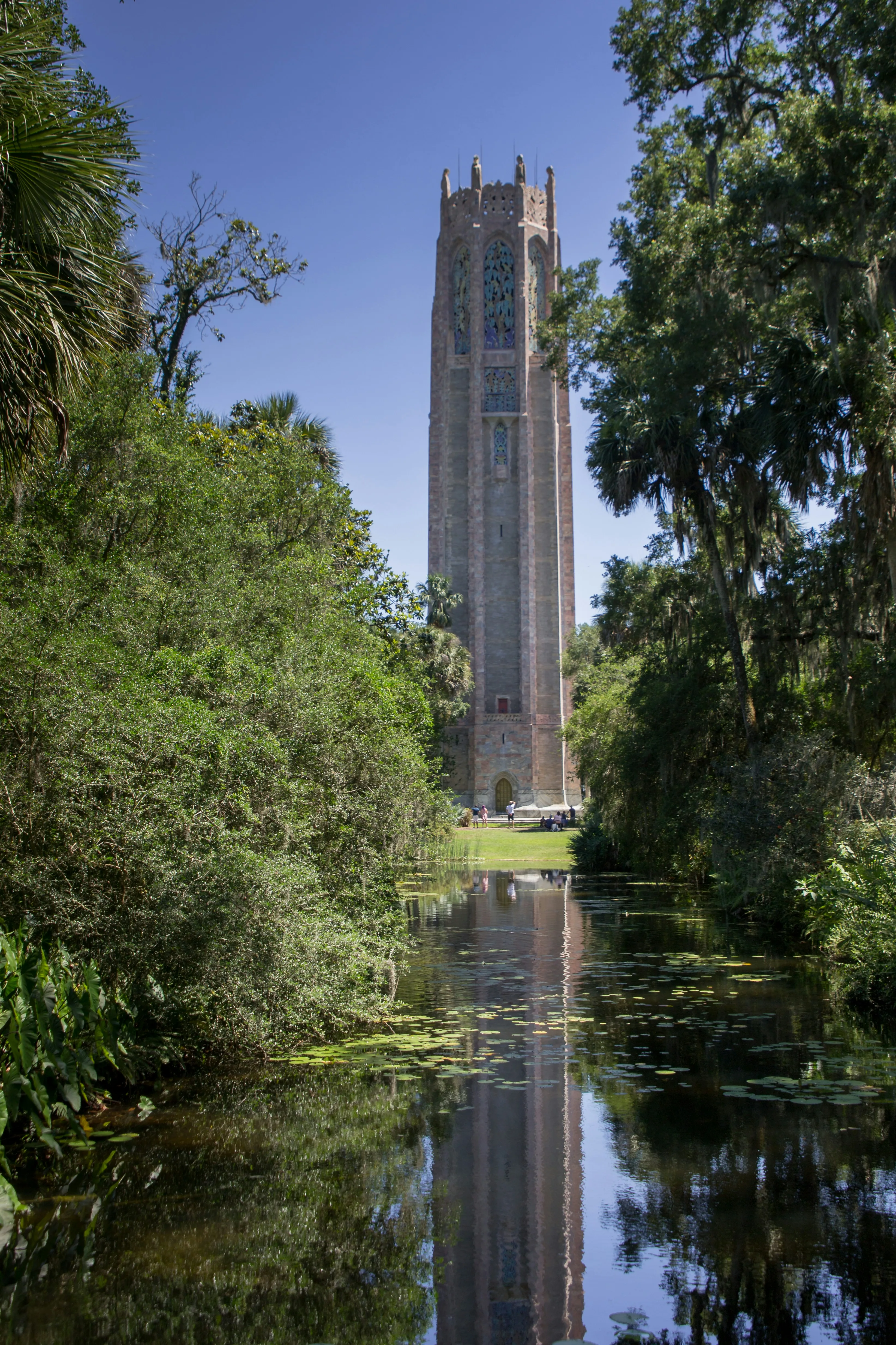 The Singing Tower at Bok Tower Gardens reflected in the surrounding gardens