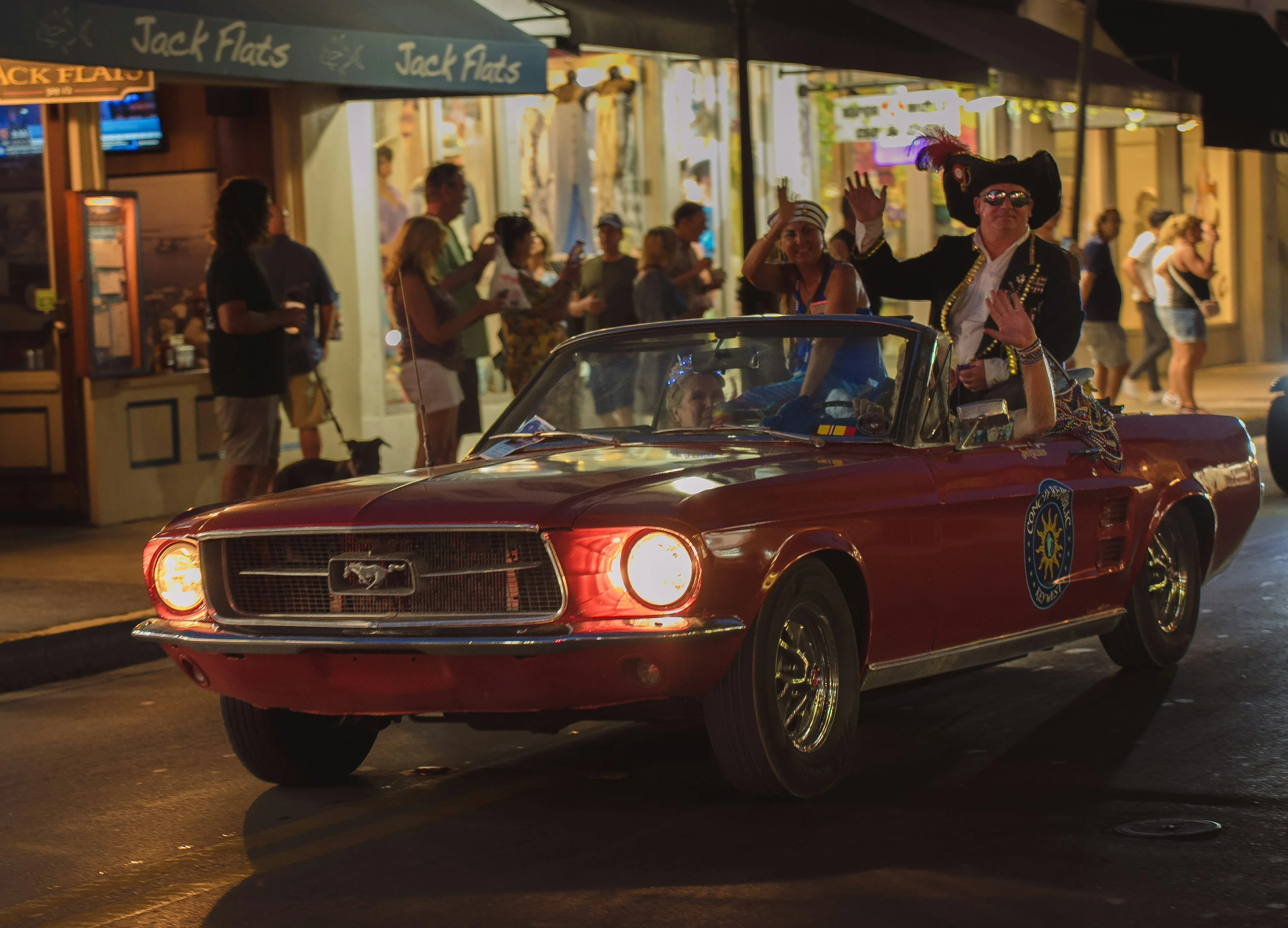 Costumed revelers cruise Duval Street during Fantasy Fest in Key West